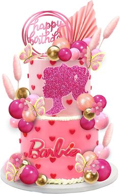 a birthday cake with pink frosting and decorations