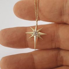 Solid Gold North Star Necklace, Dainty Pole Star Charm Necklace For Birthday Gift, Northern Star Pendant For Her, Jewelry For Christmas Gift This necklace is handmade and produced with 10k 14k 18k solid gold according to your preference. Material : 10kt 14kt 18kt Solid Gold Gold Color : Yellow Gold, White Gold, Rose Gold Gemstone : Cubic Zirconia Pendant Sizes: Height: 0.87 inches ( 22 mm) Width: 0.67 inches ( 17 mm) We have 3 types solid gold chain options: Type1 Chain (0.85mm thick) Type2 Chain (0.97mm thick) Type3 Chain (1.30mm thick) We use lobster claps on our chains. Chain length: 14 inches adjustable 13 inches 16 inches adjustable 15 inches 18 inches adjustable 17 inches 20 inches adjustable 19 inches 22 inches adjustable 21 inches The necklace is made to order. We make it ready for Northern Star Necklace, North Star Jewelry, Jewelry For Christmas, Gold Star Necklace, Northern Star, North Star Necklace, Buy Gold And Silver, Star Necklace Gold, Star Charm Necklace