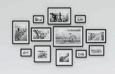 black and white photo frames on the wall with bicycles in them, all hanging up