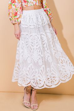 Indulge in the blissful elegance of our WOVEN LACE MIDI SKIRT, featuring a seamless back zipper closure.Details:Self : 100% PolyesterLining : 100% PolyesterSize & Fit- Model is 5`10" And Wearing Size Small- Measurements Taken From Size Small- Approx. Length: 35.5" White Feminine Tiered Maxi Skirt, White Lace Flowy Maxi Skirt, White Long Feminine Skirt, White Lace Trim Midi Skirt, White Midi Skirt With Lace Trim, Feminine White Tiered Skirt, Feminine White Lace Bottoms, White Tiered Skirt For Brunch, Spring White Lined Maxi Skirt