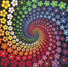 an art work with lots of different colored dots in the shape of a rainbow spiral