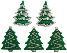 four green christmas trees with silver sparkles on them, all in different shapes and sizes