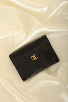 CONDITION: VERY GOOD , dustbag, box, and care booklet.??¨ This cute little Chanel cardholder in black caviar with gold hardware adds the perfect touch of sleekness and style to your wardrobe! Includes three card slots and a pocket in the middle. Simple, yet a stylish statement.??¨~ Beth Crafted in??¨2021 4.5" L x 3" H??¨ Please note: Slight discoloration on hardware.??¨ In order to meet the current demand and given the??¨nature of sourcing inventory, all sales are final. Please be sure to review all pictures and ask any questions prior to making a purchase! To prevent any form of fraud, I??¨keep video records of??¨myself??¨packaging??¨and dropping off each order, and??¨all??¨orders ship with??¨tracking and??¨signature??¨confirmation. Please ensure your shipping address is correct as we are Chanel Cardholder, Girl Backpacks School, Chanel Caviar, Black Caviar, Handbag Wallet, Wallet Accessories, Girl Backpacks, Exclusive Bag, Prada Bag