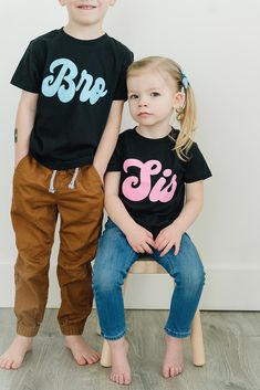 Retro Bro Sis Shirts - for the coolest Brothers and Sisters! This listing is for your choice of a Bro shirt or Sis Shirt, or you can purchase both! Simply select your size for the BRO shirt, then Add to Cart. Repeat these steps for the SIS shirt. Bro and Sis designs are professionally screen printed on a black kids tee made of 60% cotton and 40% polyester. It's super comfy and kid approved! Available in sizes from Baby up to Youth Large (14/16). Bro design is printed in Bright Blue. Sis design i Sister Brother T Shirt, 3 Sibling Shirt Favorite, Disney Brother Sister Shirts, Matching Sibling Shirts Coming Home, Sibling Shorts, Sister Matching Shirts, Star Trek Baby, Bro And Sis, Matching Sibling Shirts