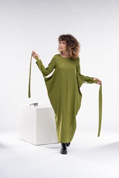 "Beautiful multiway linen dress featuring two side ties you can style in the front or in the back. This model linen dress is suitable for all body shapes and sizes as it is loose and comfy. Made from beautiful bright color here - moss green, you can choose another color from our linen collection. The model in the picture is 176cm. ⅼ 5.8 ft. tall and is wearing size S / color: Moss Green 🌟 INFO: * Worldwide EXPRESS shipping - please provide a phone number for shipping documents * US Sizing XS to Shipping Documents, Convertible Clothing, Multiway Dress, Wrap Dress Long, Linen Wrap Dress, Linen Sundress, Linen Collection, Comfy Dress, Japanese Dress