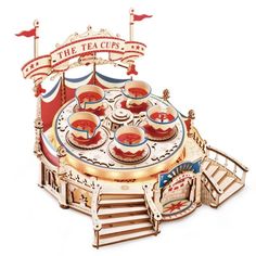 the tea cup carousel is made out of wood