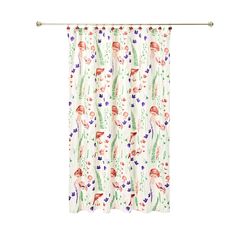 a curtain with flowers and plants on it