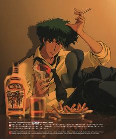 a man sitting on the floor next to a bottle of alcohol and a plate of food