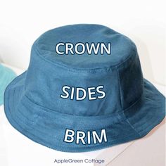 a blue hat with the words crown sides brim on it