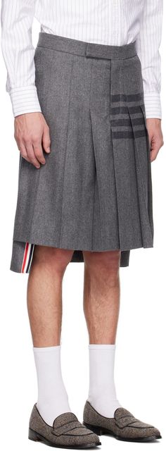 Wool and cashmere-blend flannel skirt. Pleats throughout. · Button-fly · Stripes at front and back · Tricolor grosgrain trim at droptail hem · Adjustable buttoned tab at back waistband · Tricolor grosgrain pull-loop at back waistband · Full satin lining Supplier color: Medium grey Knee Length Skirt Outfit, Knee Length Skirts Outfits, Flannel Skirt, Gray Skirt, Knee Length Skirt, Thom Browne, Curator Style, Skirt Outfits, Tri Color