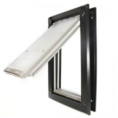 an open window with a white curtain hanging from it's side and black frame