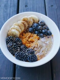 a white bowl filled with different types of food