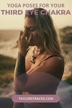 a woman sitting on the ground with her eyes closed and hands clasped to her face in yoga poses for your third eye chakra