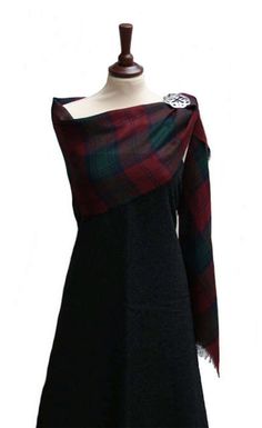 - Made in Scotland - Medium Weight (13oz) Wool - Premium Wool Tartan - Measures Approx. 27″ x 72″ These stoles are made in Scotland from medium weight (13oz) premium wool tartan. They are a great way to represent your heritage in any setting. The stole is also a perfect way to add a bit of warmth or elegance to any ladies attire. It's a lovely accent piece to display your tartan with any casual or formal wear. 27″ wide by 72″ long. Dress Stuart Tartan, Tartan Wedding Dress Scotland, Black Dress With Tartan Sash, Tartan Bridesmaid Shawl, Tartan Bridal Shawl, Flannel Wedding Dress Plaid, Scottish Wedding Dress Sash, Mackenzie Tartan, Tartan Sash