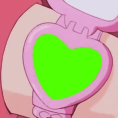 a pink toilet with a green heart on the lid