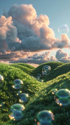 soap bubbles floating in the air over a green field with grass and clouds behind it