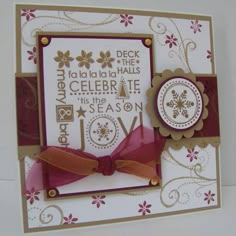 a close up of a greeting card with a bow on the front and back of it