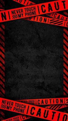 there is a red caution sign in the middle of some black and red tapes with words on it