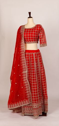 Beautiful red, organza silk lehenga with silver glitter zari embroidery work. The blouse is slip on (no side zipper or hooks) with quarter sleeves. There is one inch seam available on both sides of the blouse to make bigger if needed. There is bra padding and waist string included in the lehenga. Measurement: Chest = 17 inches (1 inch additional available on both left/right sides of blouse to expand to make larger if needed) Waist = 16.5 inches Length = 13.5 inches Red Cutdana Choli For Party, Party Red Choli With Cutdana Details, Red Anarkali Organza Sets, Red Tissue Silk Sharara With Cutdana, Red Blouse Piece For Reception Eid, Red Blouse Piece For Reception On Eid, Red Blouse Piece For Reception And Eid, Red Organza Blouse Piece With Traditional Drape, Red Tissue Silk Sharara For Eid