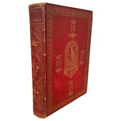 an old red book with gold trimming