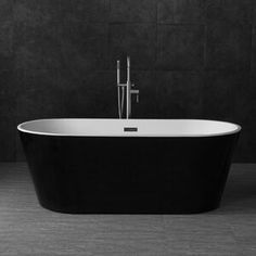 a black and white photo of a bath tub