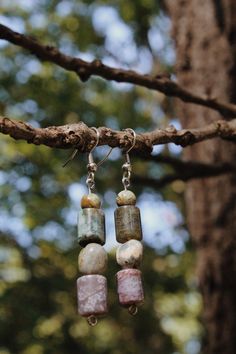 These earrings feature jasper, rhyolite, and quartz stones. These dangle earrings measure roughly 2 and 1/2 inch in length and are composed of rhodium (nickel-free).  Please keep in mind that gemstones may have imperfections and may vary from the photos. Gemstones are fragile so please handle with care! All earrings are handmade by me in Michigan and inspired by the natural beauty of the Great Lakes region. Artisan Jasper Teardrop Jewelry, Bohemian Multi-stone Dangle Jewelry, Adjustable Hand-strung Jasper Jewelry, Bohemian Multi-stone Dangle Earrings, Multicolor Hand-strung Jasper Jewelry, The Great Lakes, Etsy Earrings Dangle, Quartz Stone, Great Lakes