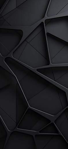 an abstract black wallpaper with lines and shapes in the center, as well as triangles