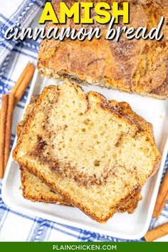 two slices of cinnamon bread on a white plate with cinnamon sticks in the foreground