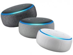 two white and gray speakers are next to each other on a white surface with blue trim