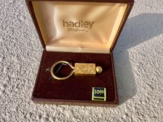 Simple and classic vintage Hadley 12k gold fill key chain. The bottom unscrews to release the top, where keys are loaded onto the chain. A touch of regency elegance or a great gift! New-in-box. Please note that since this is a used vintage item, it is being sold as is and is therefore not returnable. Please ask any questions you have about this item before purchasing. Cute Lanyards For Keys, Cute Lanyard, Vintage Keychain, Lanyard For Keys, Cute Lanyards, Key Lanyard, Classic Vintage, Key Chain, Lanyard