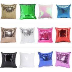 different color sequinized pillows on white background