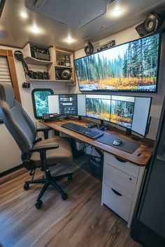 a computer desk with two monitors on top of it