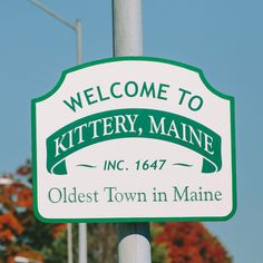 a welcome sign for the oldest town in maine