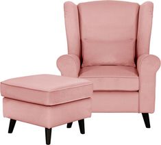 a pink chair and footstool sitting next to each other