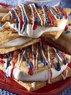 three crackers with red, white and blue icing sitting on top of each other