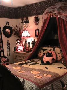 a bed room with a neatly made bed and lots of decorations