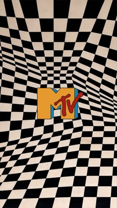 an abstract black and white checkered wallpaper with the tv logo