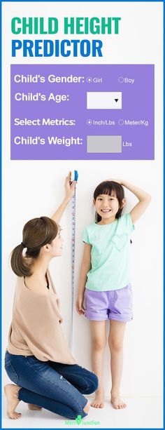 a woman measuring the height of a child's height