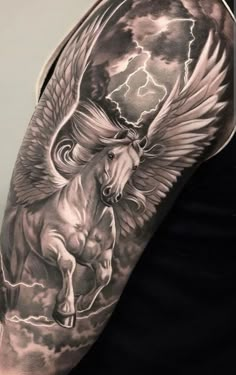 a man with a black and white tattoo on his arm, holding a horse in the sky