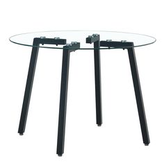 a round glass table with metal legs and two black handles on each side, against a white background