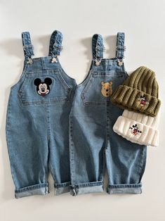 - Denim overalls, adjustable strap- Disney Mickey and Pooh face embroidery at kangaroo pocket- Made in South Korea Model: 3'6" 42lbs wearing a size 5-6y(xl) 3'1" 33lbs wearing a size 3-4y(m) 2'10" 31lbs wearing a size 2T(s)Size9-12m(xs) : 2'3"~2'5" , 19.8~22lbs2-3y(s) : 2'5"~3' , 22~26.5lbs3-4y(m) : 3'~3'3" , 26~33lbs4-5y(l) : 3'3"~3'5" , 33~37.5lbs6-7y(xl) : 3'5"~3'9" , 37.5~44lbsCare Machine wash cold with like colors.Do not bleach. Hang dry.Cool iron if needed. Do not dry clean. Toddler Disney Outfit, Disney Park Outfits, Disney Toddler Outfits, Kids Disney Outfits, Disney Family Outfits, Mickey Face, Dog Nursery, Face Embroidery