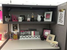 an office cubicle with various items on it