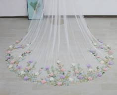 Primary color means Tulle Color not Lace Color Can also make Wedding cape/Hooded cape but need extra pay Give us a chance,we will give you a satisfactory product! Please contact customer service for custom length prices thank you Material: Lace&Tulle Pic color:Ivory Pic length:Cathedral 118in/300cm Accept Custom Orders Beauty Veil make your wedding perfect! Shipping and processing time 7-10 Days+ I will check carefully and pack carefully. Because of the color contrast of the computer monitor,there will be a slight color difference. RETURN OR EXCHANGE: If the DRESS/VEIL you receive has no quality problem,we generally don't accept the return/replacement. For Order cancel: If you want to cancel the order after purchase,please contact us within 72 hours of purchase,otherwise we will not accept Floral Bridal Cape, Floral Veils Bridal, Flower Embroidered Veil, Embroidered Veil Wedding, Fairy Core Wedding, Wildflower Veil, Flower Garden Wedding, Veil With Flowers, Floral Wedding Veils