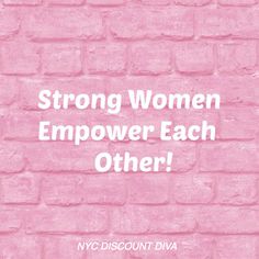 a pink brick wall with the words strong women empower each other