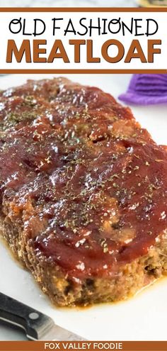 an old fashioned meatloaf on a white plate