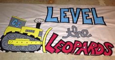 a banner that says level the leopards with an image of a bulldozer