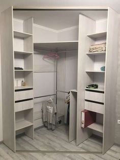 the closet is clean and ready to be used for storing items or other things in