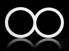 two white circles on a black background with reflection in the middle and one circle at the top