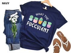 What the fucculent?!? What a cute little cactus shirt!  This funny plant shirt is the perfect succulent gift for all the plant moms out there. Treat the plant mama in your life right with this Mother's day, birthday gift, or just because.   Are YOU the crazy plant lady?  Get it for yourself!  Our plant lover shirt is printed on high-quality Bella and Canvas tees. We splurge on Bella & Canvas shirts for the ultimate softness and fit.   Unisex sized, available in 8 awesome colors. Shipped fast and free! Sizing chart located in the listing photos.  Love the design but want a different item or color (mug, pillow, sweatshirt?!)?  Reach out and we'll make it happen!  Text is either black or white, depending on shirt color (see listing photos for details) Tee Details: This classic unisex jersey s Plant Mama, Cactus Shirt, Succulent Gift, Succulent Gifts, Mama Gifts, Plant Lover Gift, Plant Mom, Plant Lady, Plant Lover