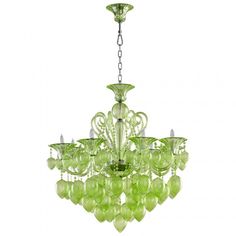 a green chandelier hanging from a ceiling